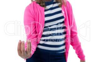 Girl pretending to be holding invisible object