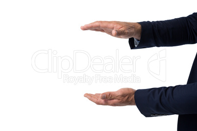 Businessman pretending to hold something