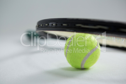 Close up of racket on tennis ball