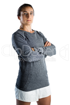 Portrait of confident female coach with arms crossed