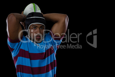 Sportsman wearing helmet while playing rugby