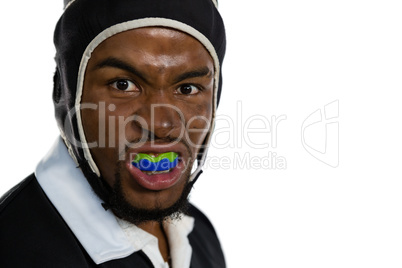 Portrait of male rugby player with mouthguard