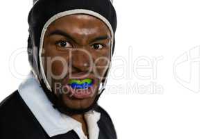 Portrait of male rugby player with mouthguard