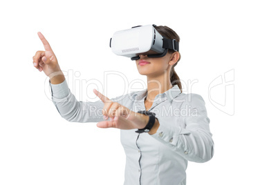 Female executive using virtual reality headset