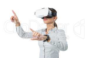 Female executive using virtual reality headset