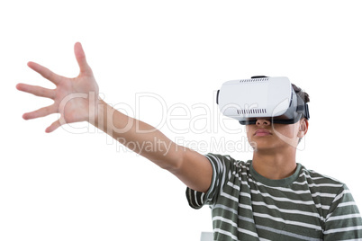 Teenage boy using virtual reality headset