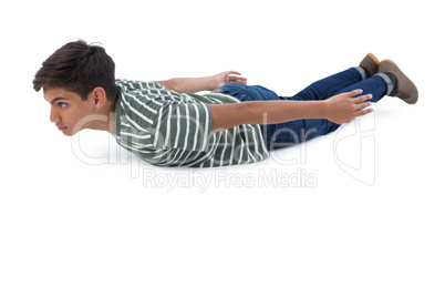 Teenage boy lying on the floor