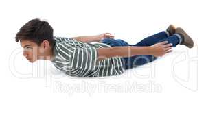 Teenage boy lying on the floor