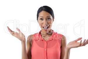 Beautiful woman gesturing against white background