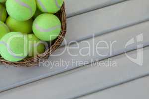 High angle view of tennis balls in wicker basket
