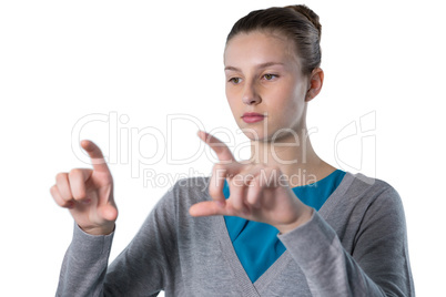 Teenage girl forming a finger frame