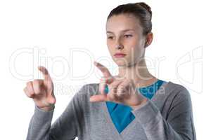Teenage girl forming a finger frame