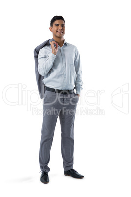 Happy businessman standing on white background