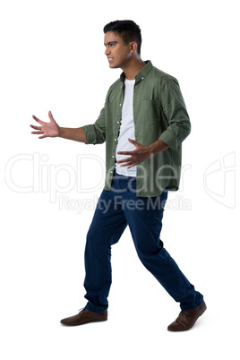 Man gesturing against white background