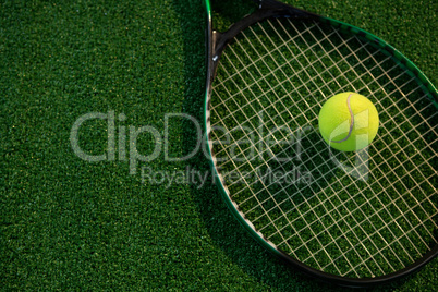 High angle view of tennis ball on racket
