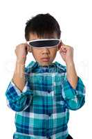 Boy using virtual reality glasses