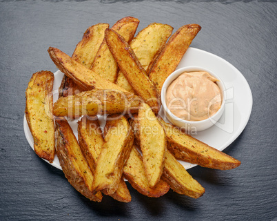 fried potatoes with Mexican sauce