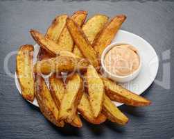 fried potatoes with Mexican sauce