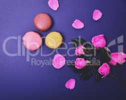 macarons and a bouquet of pink roses