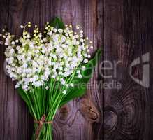 Bouquet of blossoming lilies of the valley