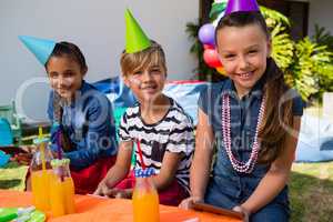 Portrait of smiling children during birthday party