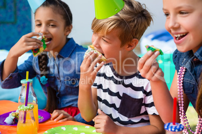 Kids having cake