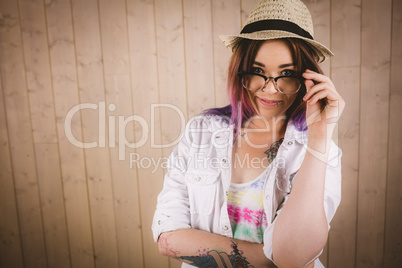 Girl in spectacles posing