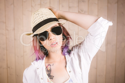 Girl in sunglasses posing