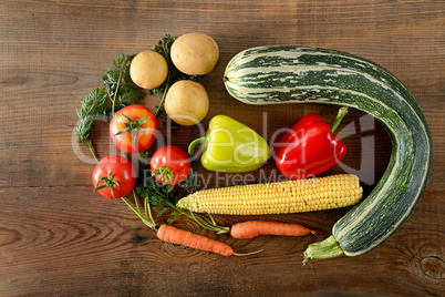 Healthy food background . different vegetables on old wooden tab
