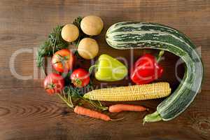 Healthy food background . different vegetables on old wooden tab