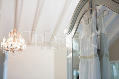 Wedding dress hanging in hanger