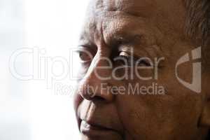 Close up of thoughtful man looking away