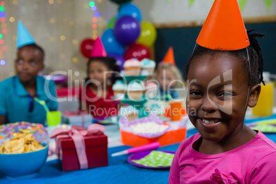 Portrait of girl with friends in background