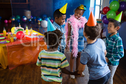 Children playing during party