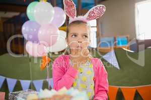 Birthday girl eating a cake