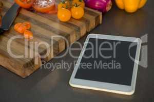 Digital tablet by vegetables