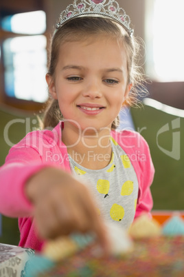 Birthday girl eating cake