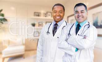 African American and Hispanic Doctors or Nurses Standing in Offi