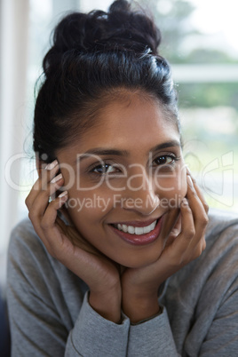 Close-up portrait of smiling woman