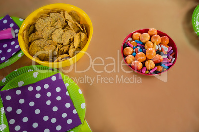 Confectioneries and decorated plates on a table