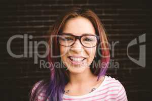Portrait of smiling woman in spectacles
