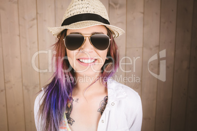 Portrait of smiling woman in sunglasses