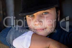 Girl relaxing in the stable