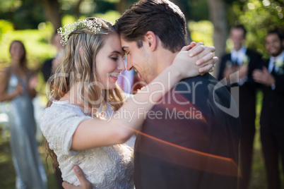 Affectionate couple embracing each other in park