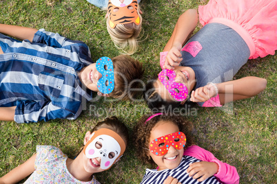 Overhead view of children wearing mask