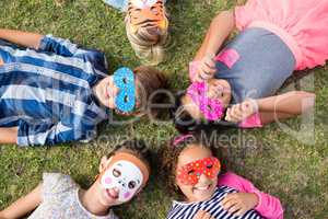 Overhead view of children wearing mask