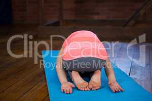 Teenage girl practicing yoga