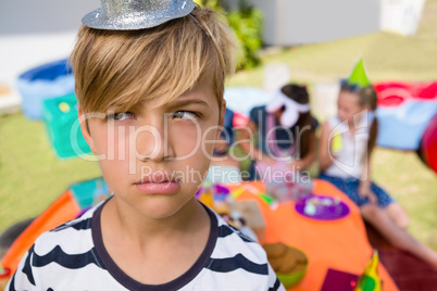 Close up of boy with friends in background