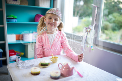 Smiling girl dressed as a fairy