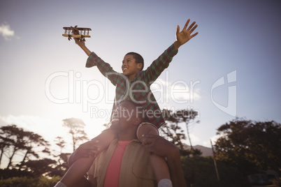 Father and son playing in the park